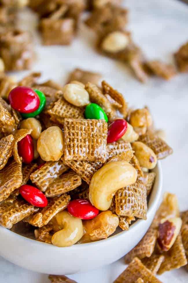 sweet and salty chex mix recipe showing a mix of chex, M&M's and nuts glazed with sugar