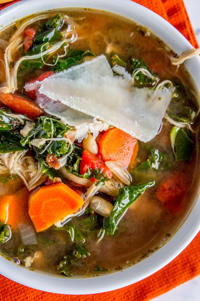 Slow Cooker Chicken, White Bean, and Kale Soup with Parmesan Shavings from The Food Charlatan