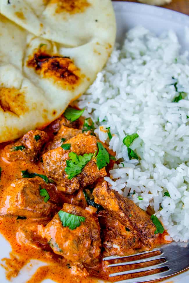 chicken tikka masala with rice and naan. 