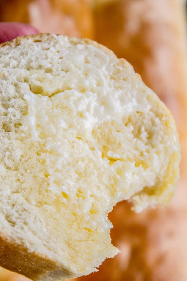 a slice of homemade French bread with butter melting on it.