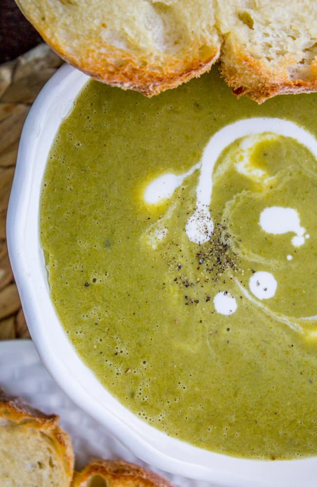 cream swirled into pea soup with fresh pepper and baguette slices.