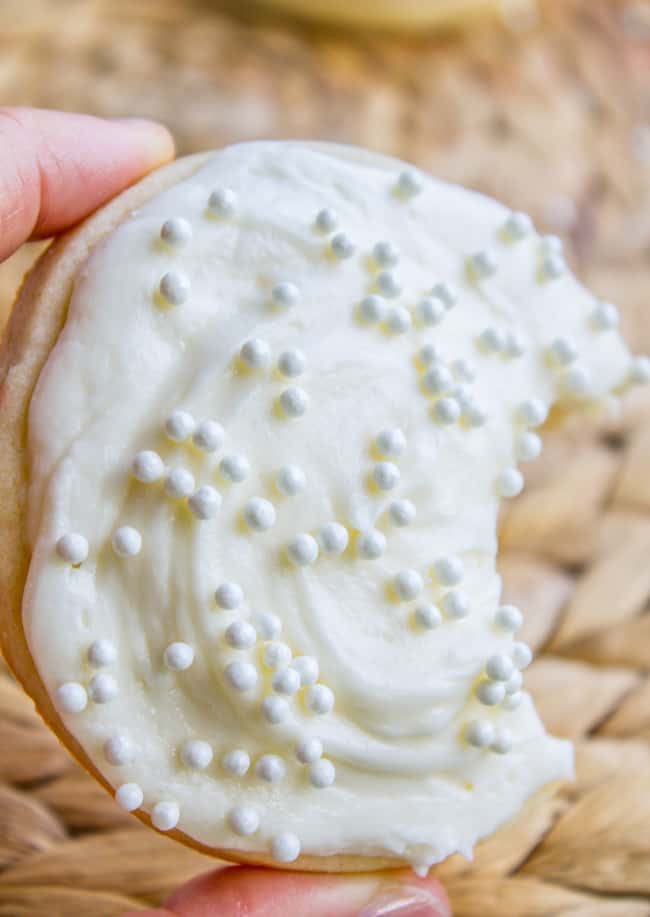 Sugar Cookie decorated with white frosting for sugar cookie and sprinkles