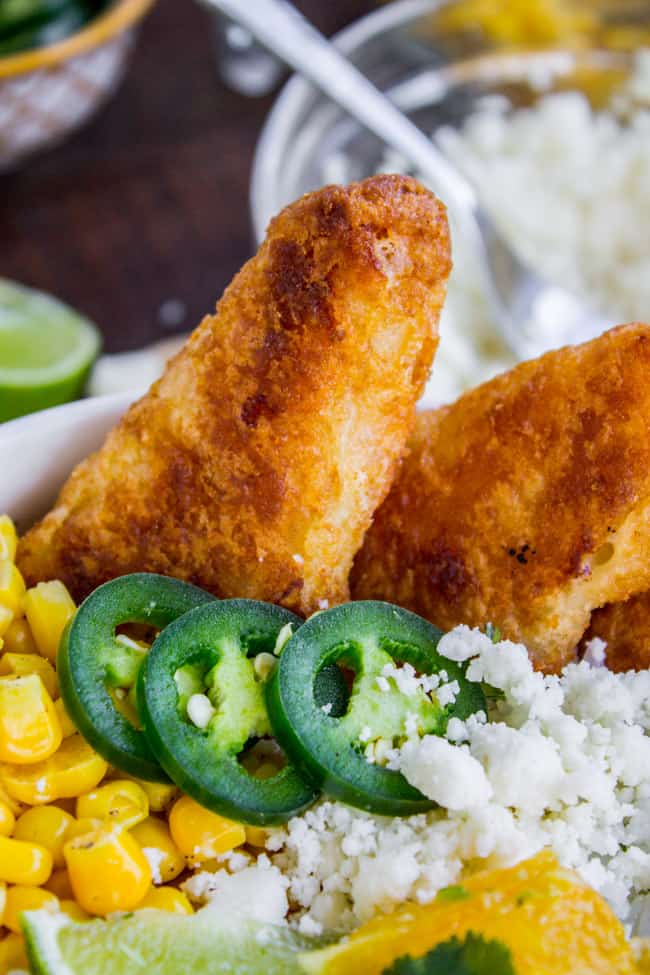 Beer-Battered-Fish Burrito Bowl with Orange Avocado Salsa from The Food Charlatan