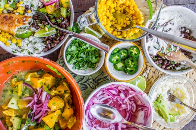 Beer-Battered-Fish Burrito Bowl with Orange Avocado Salsa from The Food Charlatan