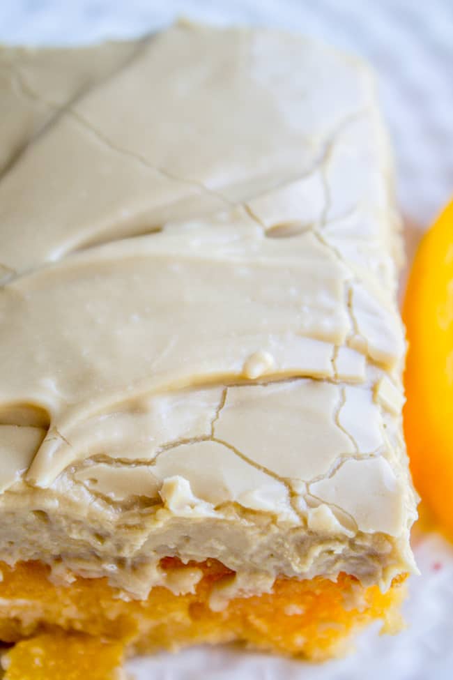 a peach cake with brown sugar frosting.