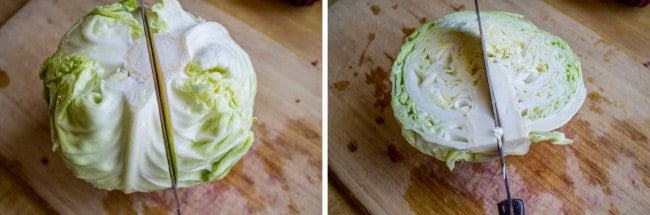 a wooden cutting board with a knife slicing a green cabbage in half.