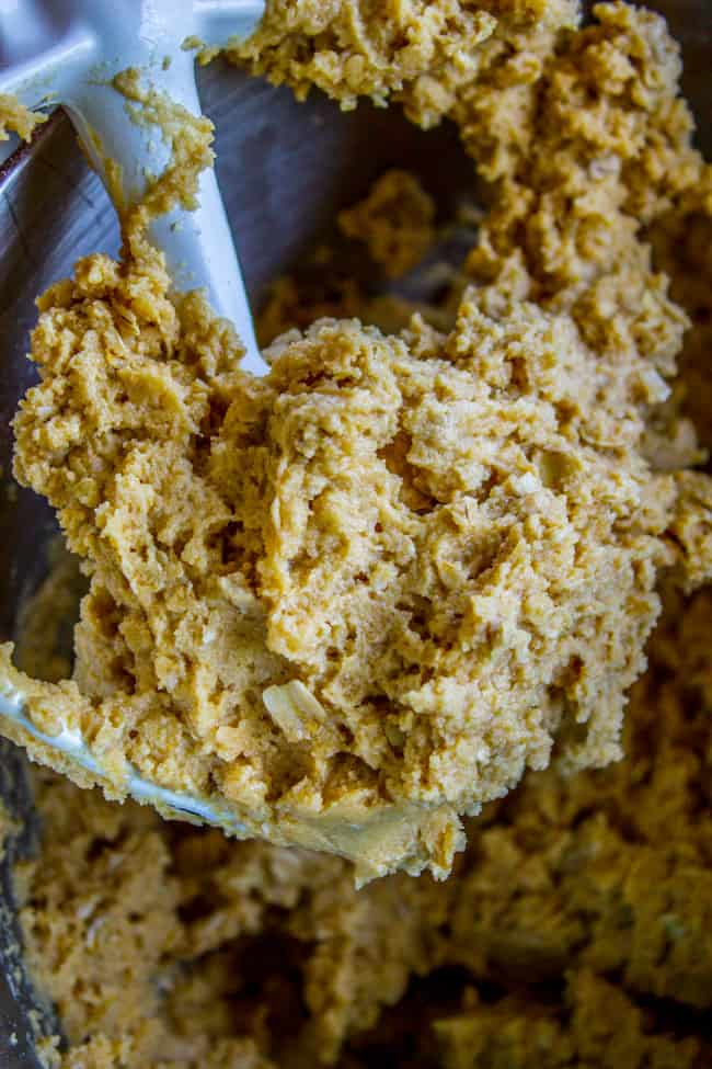 peanut butter oatmeal cookie dough in a stand mixer with a paddle attachment. 