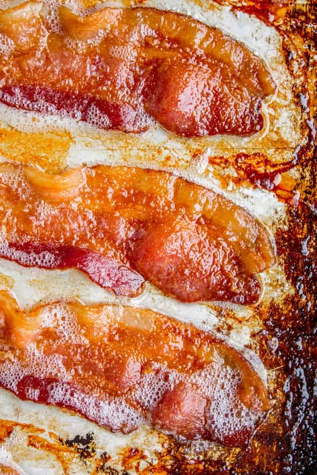 a close up shot of crispy bacon on a sheet pan.