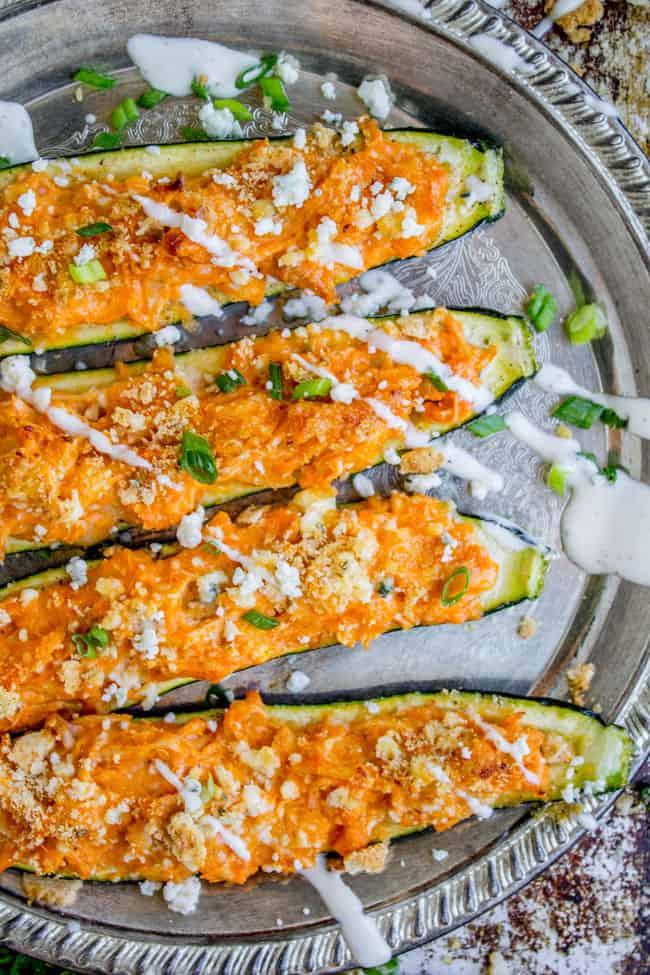 Buffalo Chicken Zucchini Boats from The Food Charlatan