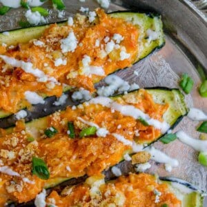 Buffalo Chicken Zucchini Boats from The Food Charlatan