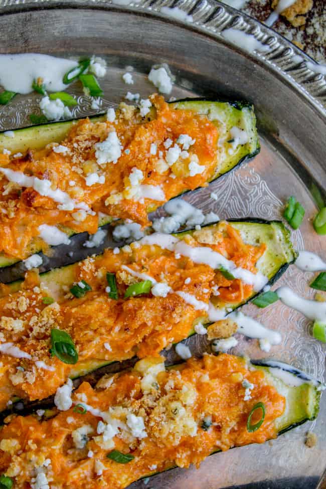 Buffalo Chicken Zucchini Boats from The Food Charlatan