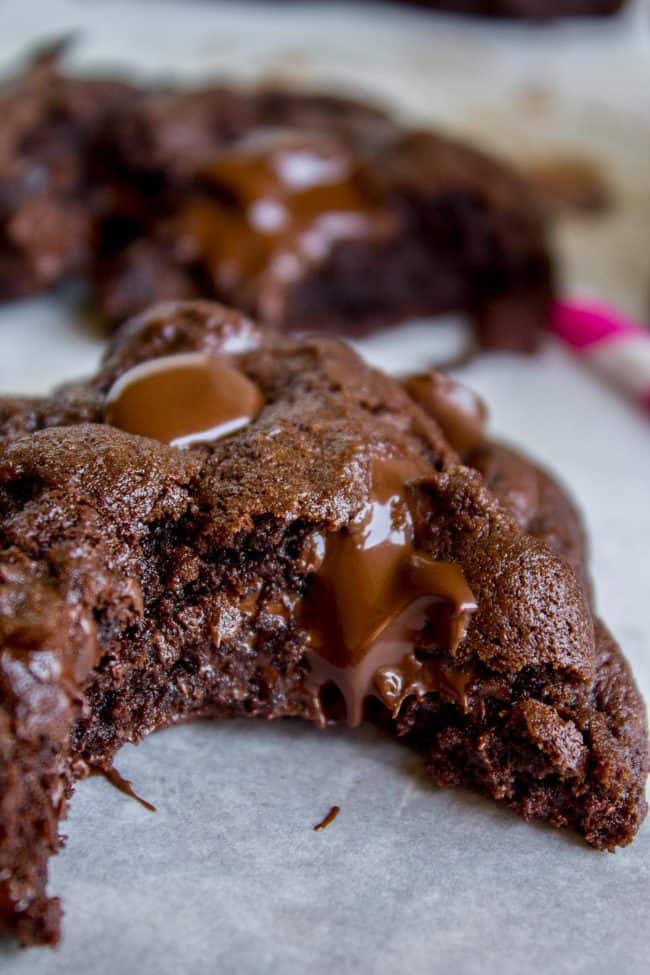 thick rich chocolate cookie with a bite taken out of it.