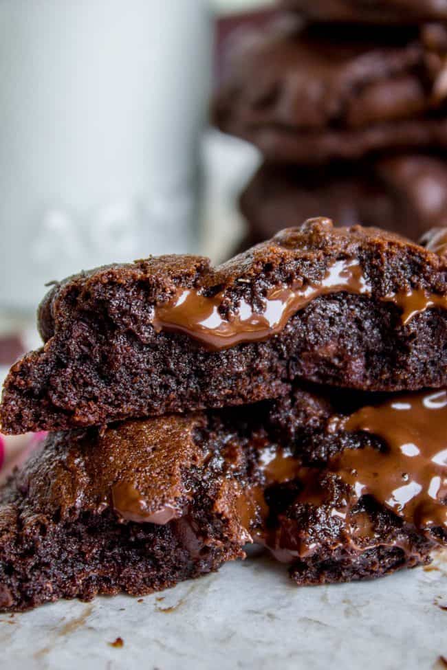 a thick rich chocolate cookie broken in half.