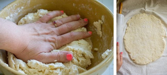 A hand kneading flaky biscuit dough