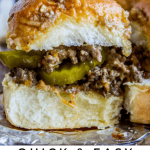 Close-up of juicy cheeseburger sliders with ground beef, melted cheese, pickles, and soft buns on a tray. Text reads: “Quick & Easy Cheeseburger Sliders. The Food Charlatan.”