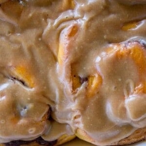 Pumpkin Cinnamon Rolls with Caramel Cream Cheese Frosting from The Food Charlatan