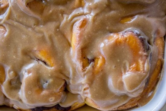 Pumpkin Cinnamon Rolls with Caramel Cream Cheese Frosting from The Food Charlatan