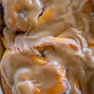 Pumpkin Cinnamon Rolls with Caramel Cream Cheese Frosting from The Food Charlatan