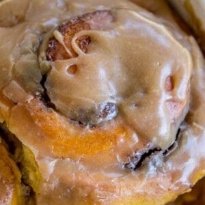 Pumpkin Cinnamon Rolls with Caramel Cream Cheese Frosting from The Food Charlatan
