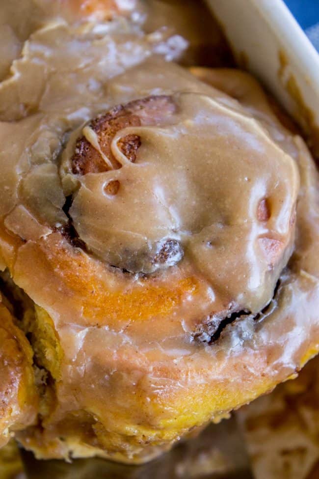 Pumpkin Cinnamon Rolls with Caramel Cream Cheese Frosting from The Food Charlatan