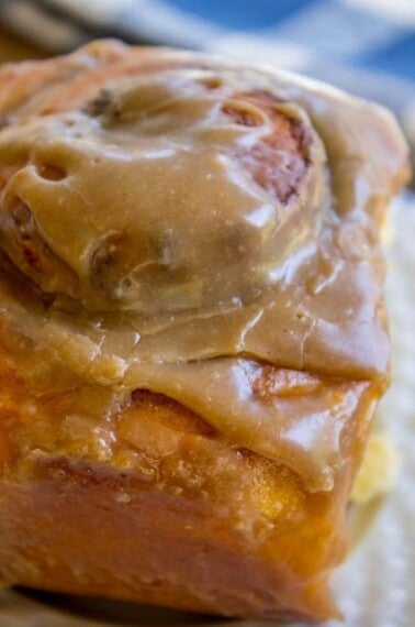 Pumpkin Cinnamon Rolls with Caramel Cream Cheese Frosting from The Food Charlatan