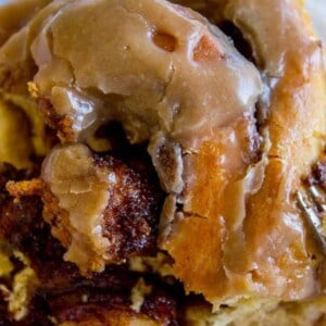 Pumpkin Cinnamon Rolls with Caramel Cream Cheese Frosting from The Food Charlatan