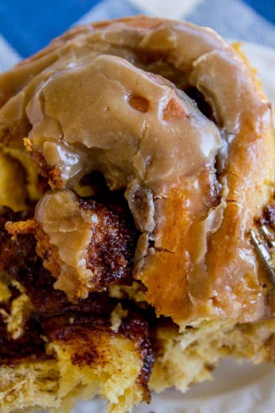 Pumpkin Cinnamon Rolls with Caramel Cream Cheese Frosting from The Food Charlatan