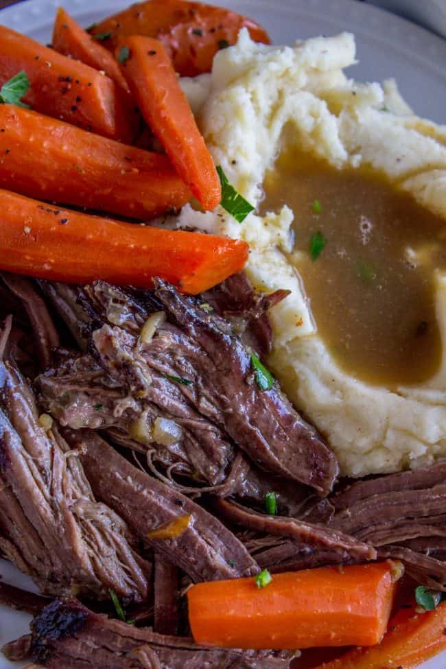 Roast meat and carrots with mashed potatoes and gravy