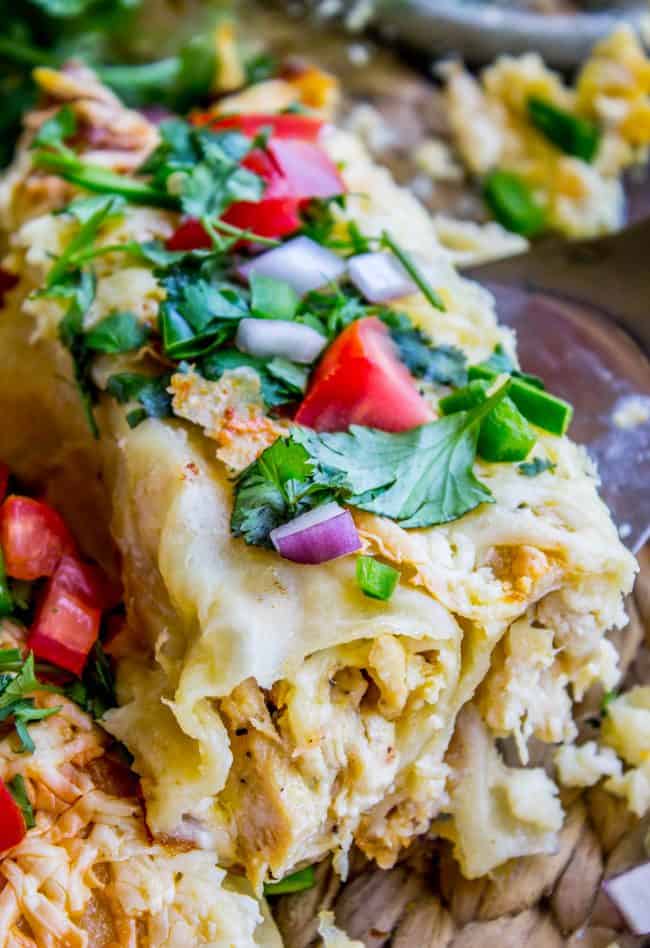 white chicken enchiladas with tomato and cilantro