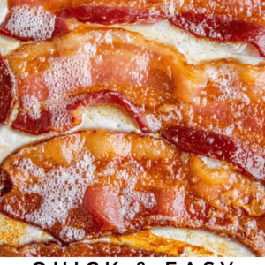 strips of crispy bacon on a sheet pan.