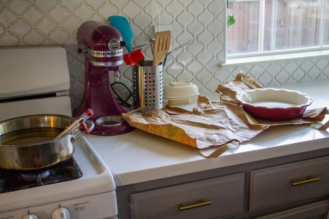 heating oil on stove for homemade donut recipe