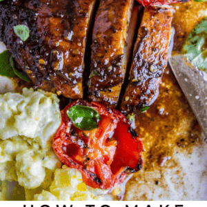 grilled chicken on a plate with veggies.