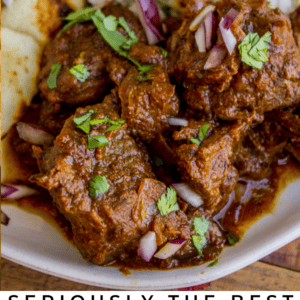 beef curry with rice and cilantro.