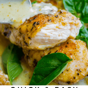 A close-up of juicy, golden-brown chicken breasts with a creamy lemon basil sauce, garnished with fresh basil leaves. Text at the bottom reads: Quick & Easy Lemon Basil Chicken Dinner The Food Charlatan.