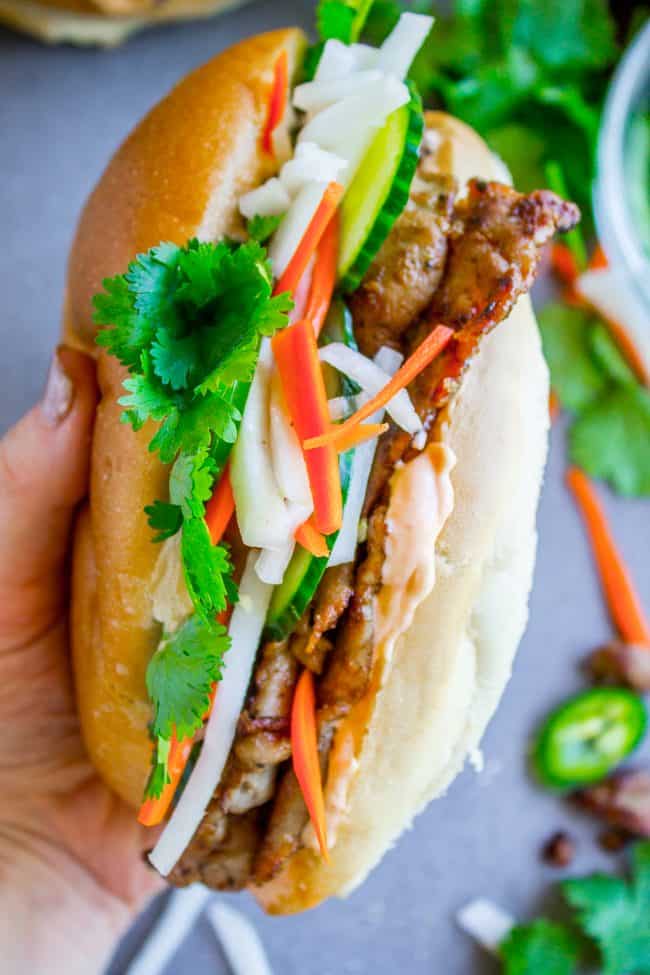 banh mi sandwich held in a hand.