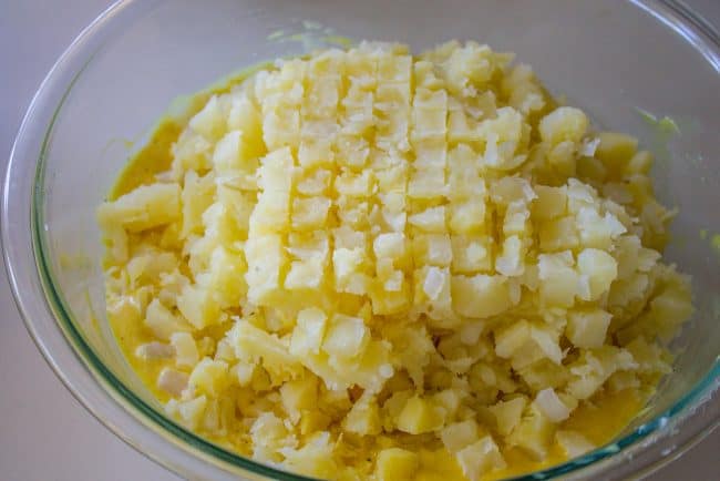 boiled potatoes cut into evenly shaped pieces.