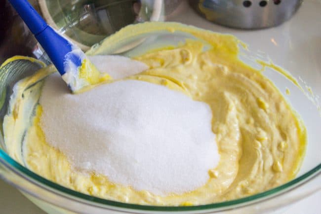 stirring sugar into potato salad. 