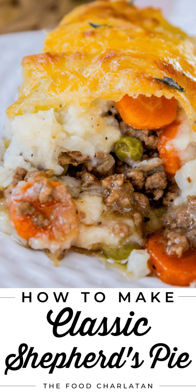 shepherd's pie with cheesy mashed potatoes on a white plate.