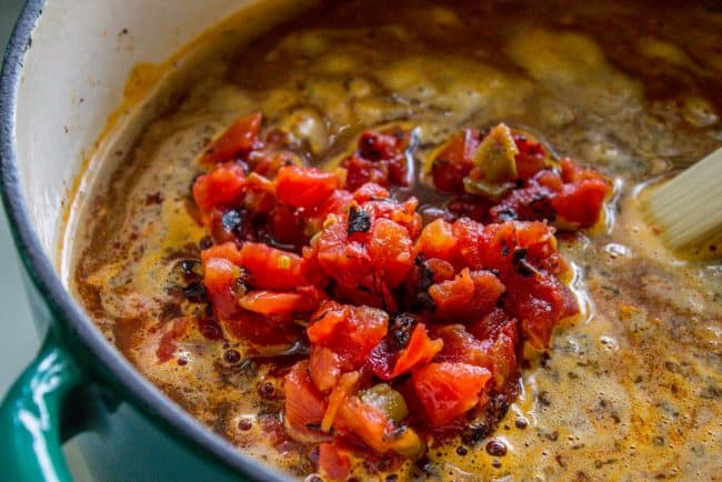 stirring fire roasted Rotel into chili.