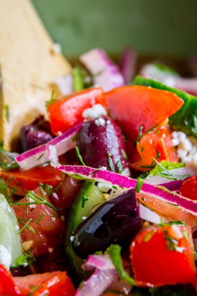 Greek tomato cucumber salad with feta cheese, red onion, and Kalamata olives. 