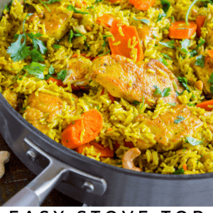 A skillet filled with vibrant yellow rice, chicken pieces, sliced carrots, and fresh cilantro. Text reads: Easy Stove Top Cheater Chicken Biryani – The Food Charlatan. This flavorful biryani is perfect for a quick weeknight meal.