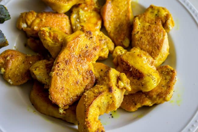 sauteed chicken in turmeric and curry powder.