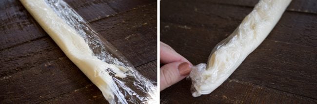 Rolling cream cheese in plastic wrap.