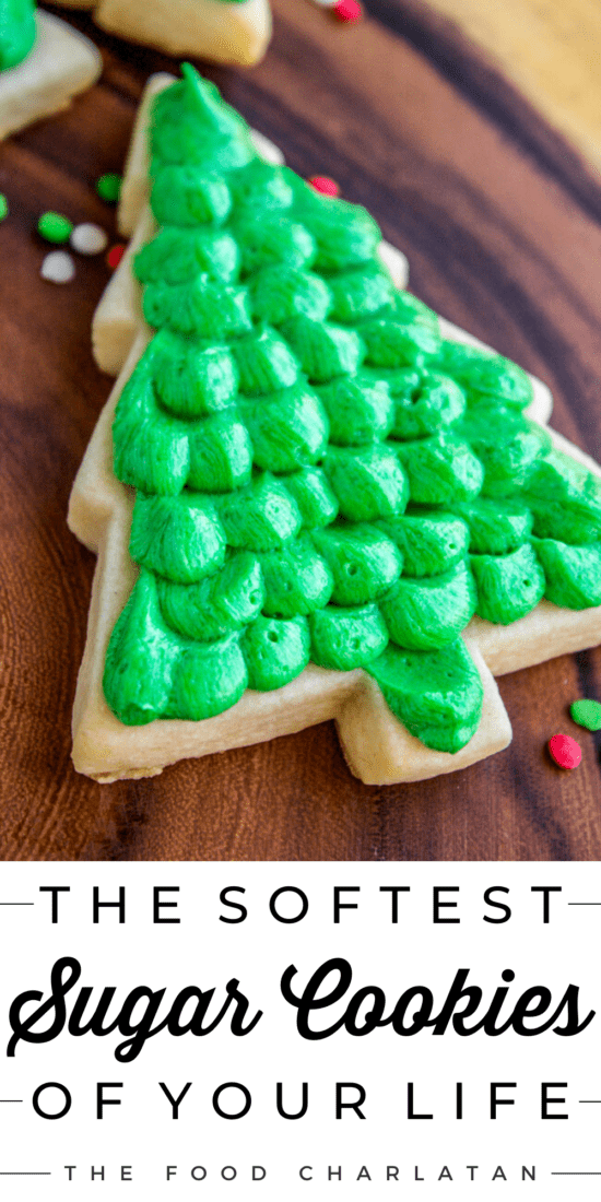 Soft Christmas-tree shaped sugar cookie with dollops of green buttercream frosting
