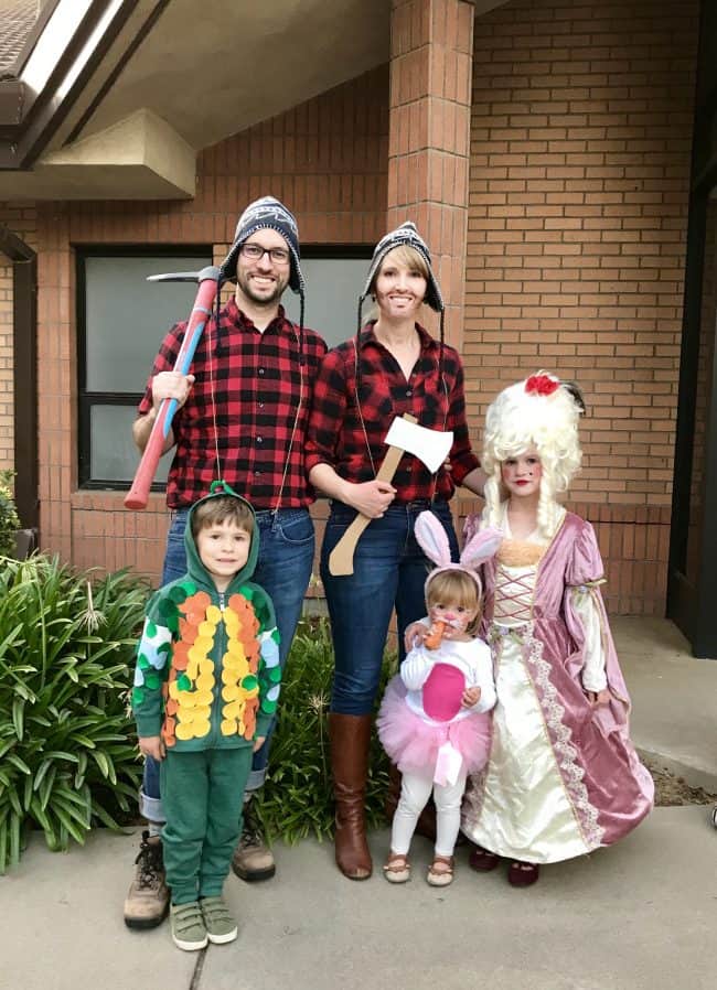 a family wearing cute halloween costumes.