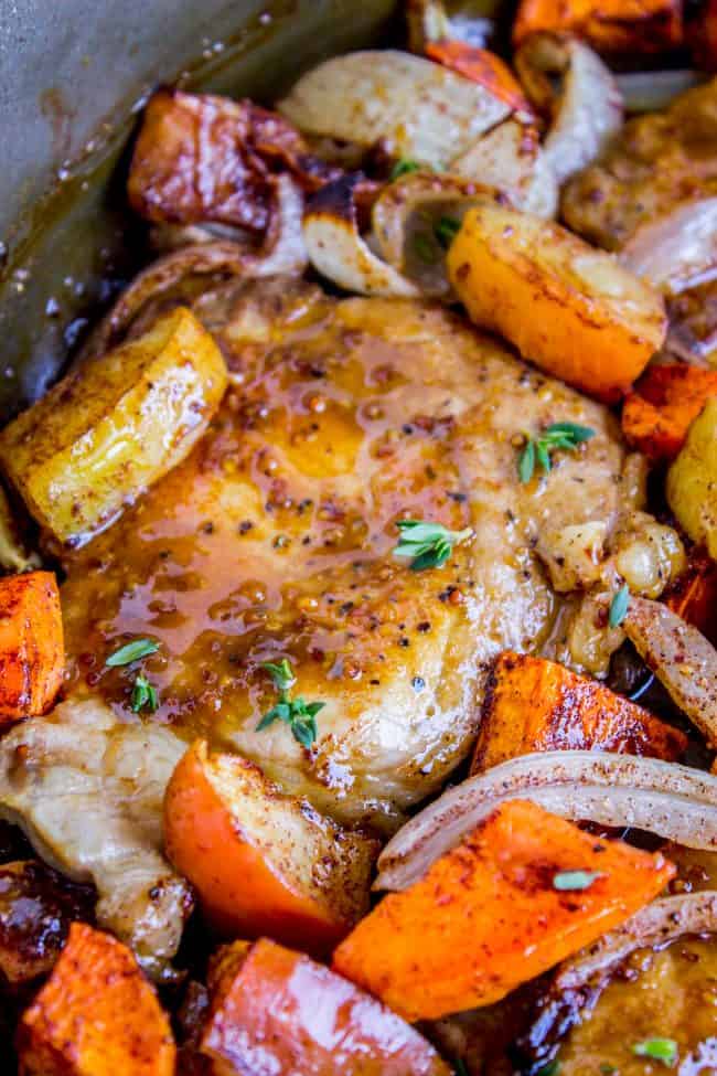 Pork chops with apples, carrots, and onions. 