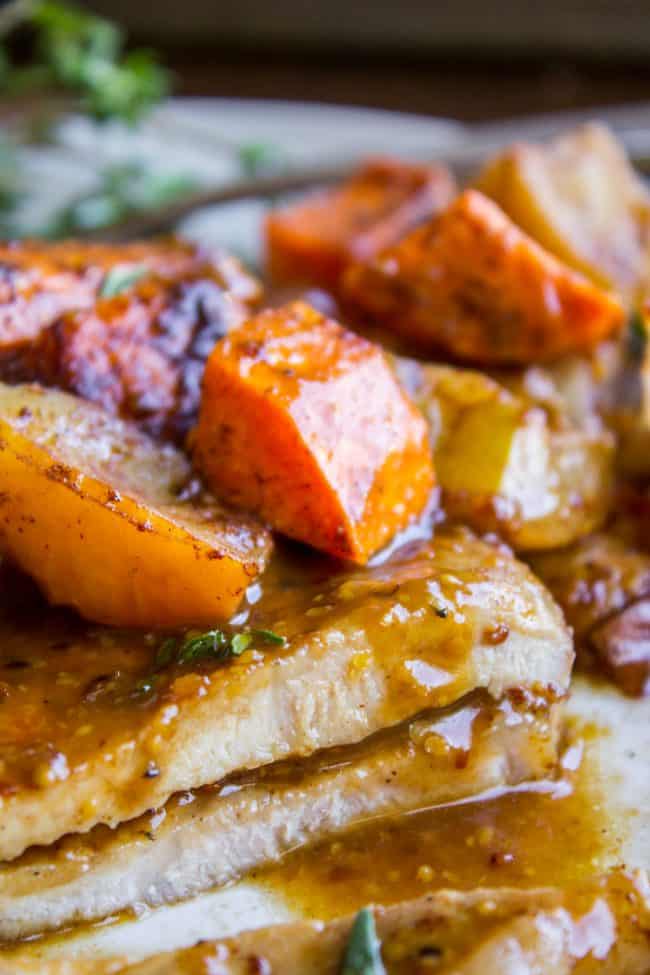 Pork chops with apples, sweet potatoes, and onions. 