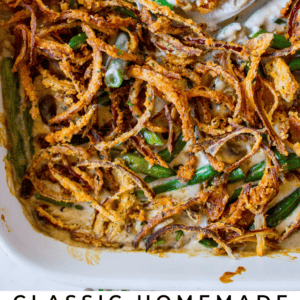 A casserole dish filled with classic green bean casserole and crispy fried onions, some scooped out to show creamy green beans inside. Text below reads: Classic Homemade Green Bean Casserole with Crispy Fried Onions.