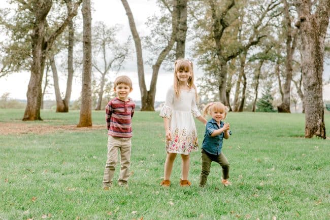 Three cute kids in nature.