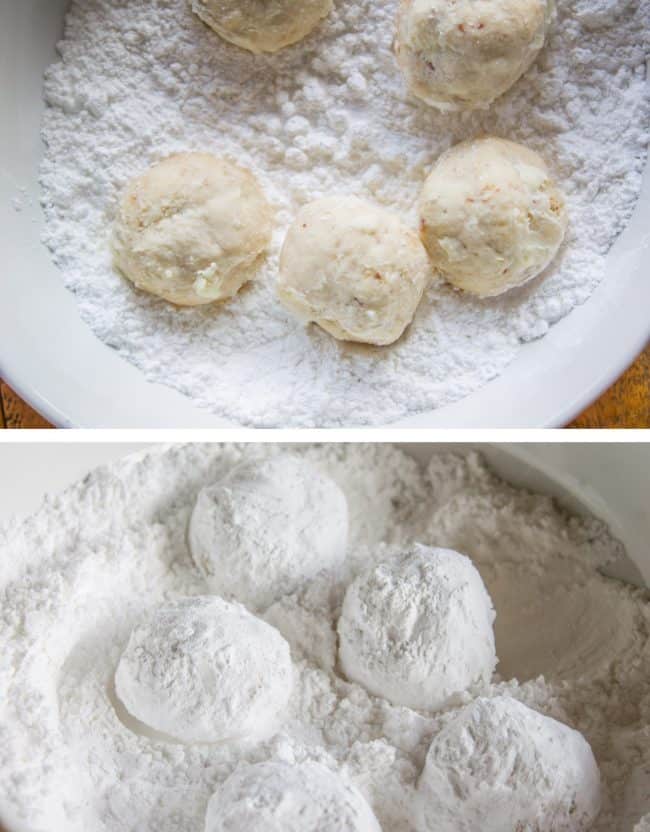 Rolling baked cookie balls in powdered sugar.